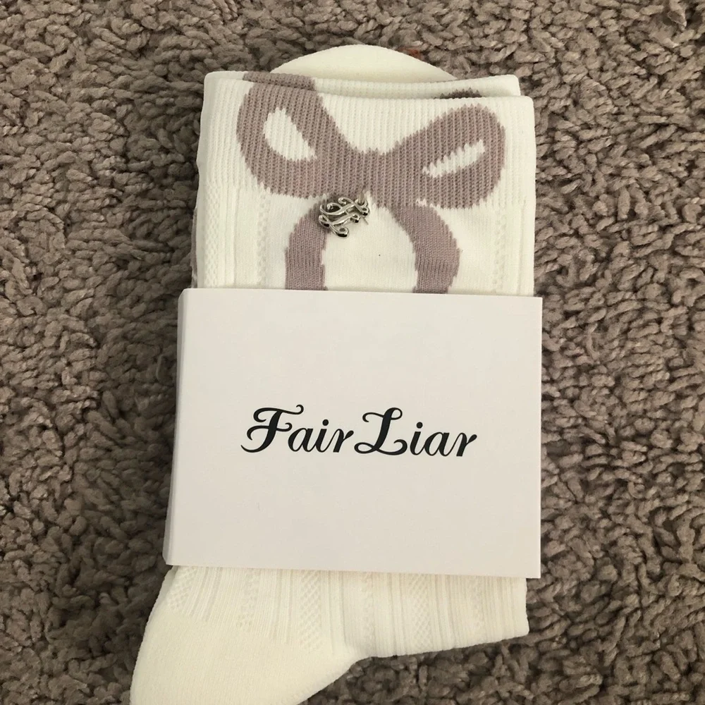 Women's Fair Lair Cream Crew Socks with Taupe Bow Accent
